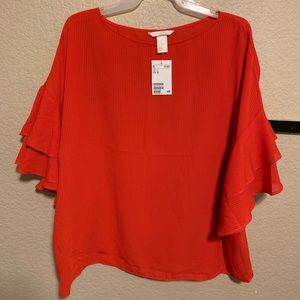 Orange top with ruffled layered bell sleeves